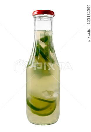 Glass Bottle of Lime Lemonade with Mint and Ice on White 135181594