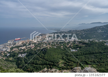 Aerial view Mountain Viewpoint of Bastia in the north of Corsica island - Genoese city overlooking the Mediterranean Sea Aerial view Mountain Viewpoint of Bastia in the north of Corsica island - Genoese city overlooking the Mediterranean Sea 135182377