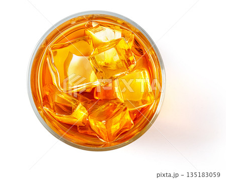 Whiskey drink with ice cubes, top view Whiskey drink with ice cubes, top view 135183059