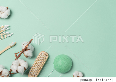 Eco-Friendly Personal Care Flatlay with Cotton and Bamboo Accessories 135183771