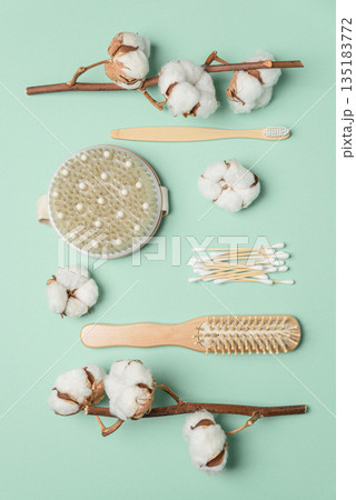 Eco-Friendly Personal Care Flatlay with Cotton and Bamboo Accessories 135183772