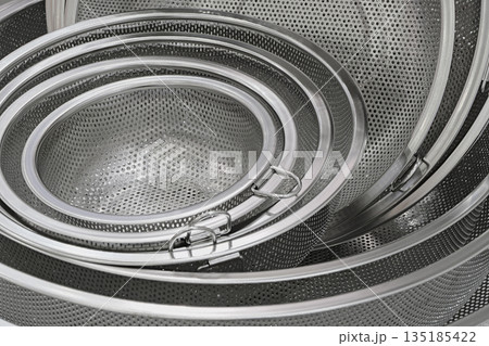 Group of round stainless steel collanders Group of round stainless steel collanders 135185422