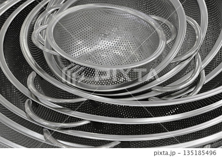 Group of round stainless steel collanders Group of round stainless steel collanders 135185496