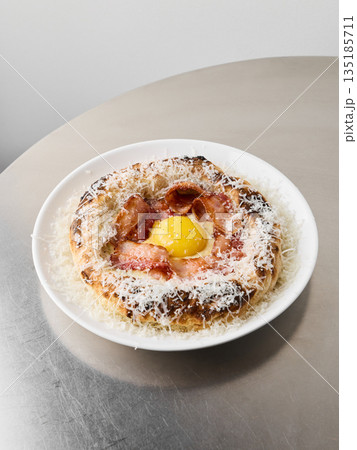 Sweet and savory brunch dish with cheese and prosciutto Sweet and savory brunch dish with cheese and prosciutto 135185711
