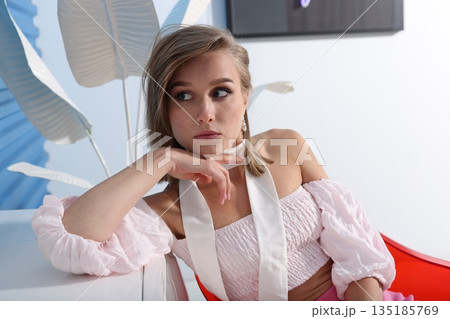 caucasian woman thoughtful closeup portrait in studio 135185769