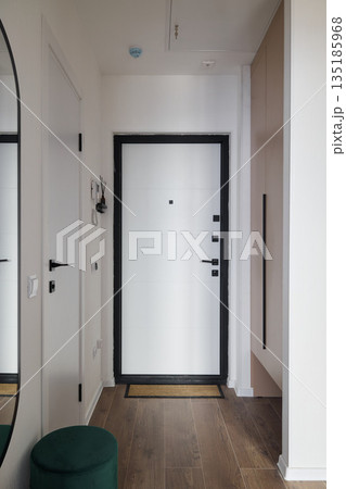 Stylish foyer featuring understated elegance and utility Stylish foyer featuring understated elegance and utility 135185968