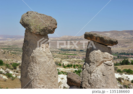 "Three Beauties" are rock formations located near the city of Urgup in Cappadocia "Three Beauties" are rock formations located near the city of Urgup in Cappadocia 135186660