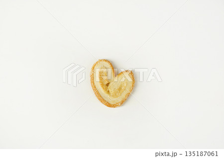 cookies in the shape of an ear on a white background cookies in the shape of an ear on a white background 135187061