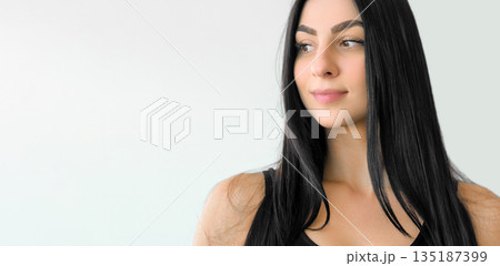 Young charm. Model girl. Natural portrait of woman with healthy face skin minimal makeup looking side. Attractive female isolated on white. Young charm. Model girl. Natural portrait of woman with healthy face skin minimal makeup looking side. Attractive female isolated on white. 135187399