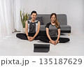 asian meditation instructors leading mindful breathwork session at home 135187629