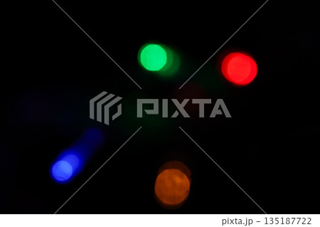 Colorful bokeh lights on black background 135187722