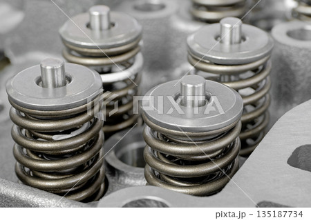 Cylinder head of an internal combustion engine with the cover removed Cylinder head of an internal combustion engine with the cover removed 135187734