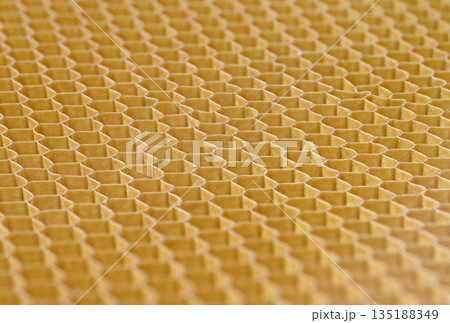 Hollow cells of honeycomb structure made of fiberglass or another composite material Hollow cells of honeycomb structure made of fiberglass or another composite material 135188349