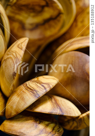 A large group of handmade wooden spoons A large group of handmade wooden spoons 135188912