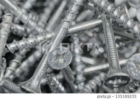 A lot of galvanized screws 135189235