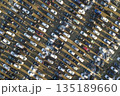 Aerial drone image of many cars parked on parking lot, top view. 135189660