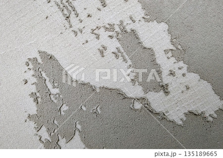 Abstract grey textured backgroung. Wall covered with cement mortar. Abstract grey textured backgroung. Wall covered with cement mortar. 135189665