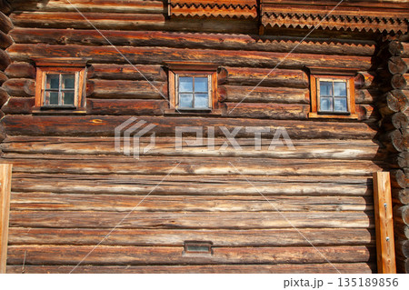 Old Russian Log House with Small Windows Old Russian Log House with Small Windows 135189856