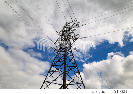 The Electricity Transmission Tower Stands Tall Against a Dramatic and Colorful Sky Above The Electricity Transmission Tower Stands Tall Against a Dramatic and Colorful Sky Above 135190892