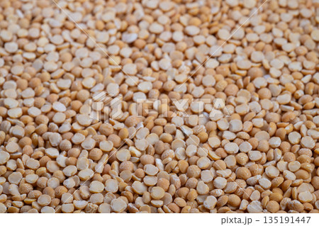 Seamless beige split peas pattern fills entire frame, subtle tonal variation, matte texture, perfect for packaging backdrops, branding moodboards, and eco product design Seamless beige split peas pattern fills entire frame, subtle tonal variation, matte texture, perfect for packaging backdrops, branding moodboards, and eco product design 135191447