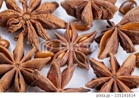 Premium star anise showcase, Showcasing exquisite star anise for culinary excellence, Display of highquality star anise used in sophisticated cooking and seasoning 135191614