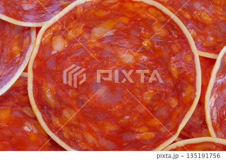 Flavorful preserved meat chunks, Delicious meat morsels and expertly cured delicacy portions, Juicy meat bites complemented by expertly prepared cured meat pieces for snacking Flavorful preserved meat chunks, Delicious meat morsels and expertly cured delicacy portions, Juicy meat bites complemented by expertly prepared cured meat pieces for snacking 135191756