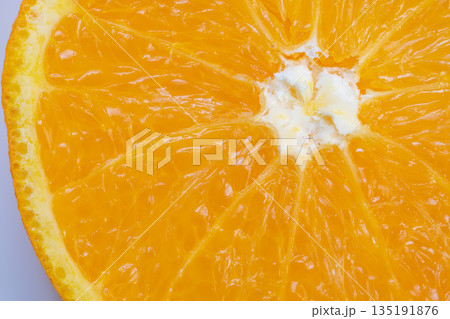 Orange segments prepared with natural oil droplets and shiny membranes, Ready orange slices with glossy membranes and droplets for fresh juice extraction process 135191876