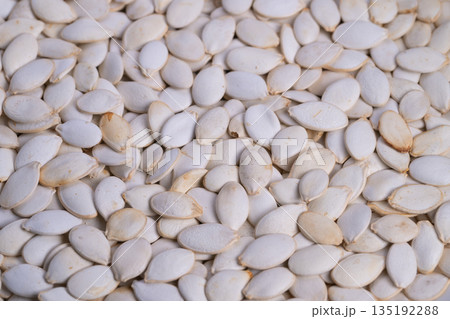 Ecofriendly packaging showcases earthgrown pumpkin kernels locally sourced, Display of natural seeds from farms with eco conscious packaging and rustic presentation style 135192288