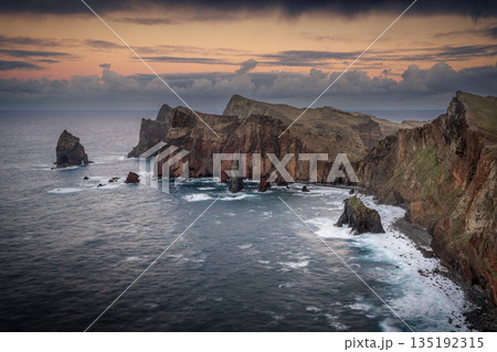 Ponta de Sao Lourenco at Sunset with Orange Sky and Clouds 135192315