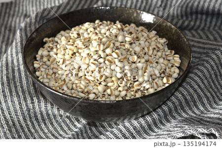 Job's tears in black bowl-Healthy food. Job's tears in black bowl-Healthy food. 135194174