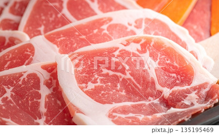Pork slices on the plate for the shabu Pork slices on the plate for the shabu 135195469