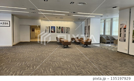 A stylish lounge with tables and sofa  135197929
