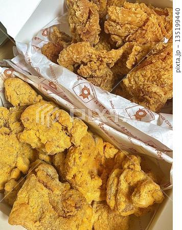 Crispy fried chicken with golden, crunchy skin and juicy, tender meat. A delicious and savory dish, perfect for any meal, served with dipping sauces or side dishes for extra flavor! Crispy fried chicken with golden, crunchy skin and juicy, tender meat. A delicious and savory dish, perfect for any meal, served with dipping sauces or side dishes for extra flavor! 135199440