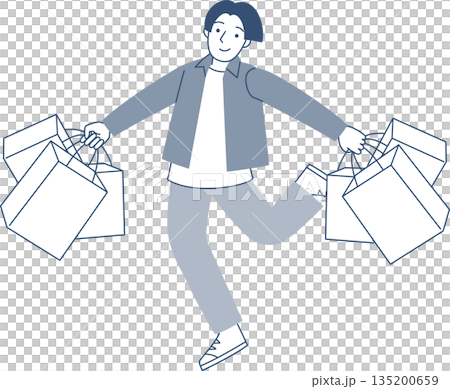 一個年輕男子帶著許多購物袋走路 135200659