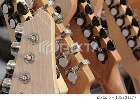 Group of guitars, traditional stringed musical instruments Group of guitars, traditional stringed musical instruments 135201177