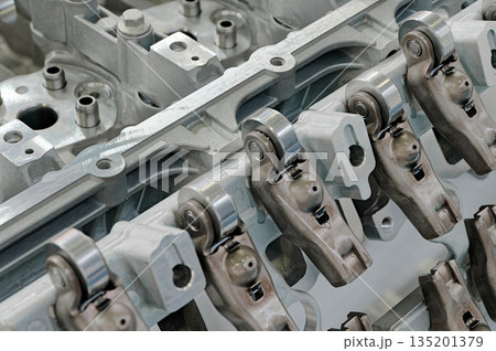 Cylinder head of an internal combustion engine with the cover removed Cylinder head of an internal combustion engine with the cover removed 135201379