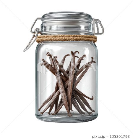 Vanilla bean pods stored in clear glass jar with metal clasp and rope detail, showcasing natural brown spice for cooking and baking 135201798