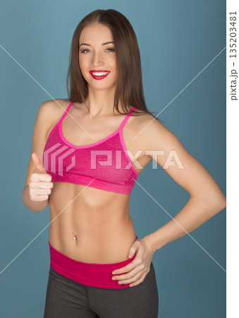 smiling beautiful sports girl 135203481