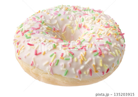 Single donut decorated with white icing and colorful sprinkles 135203915