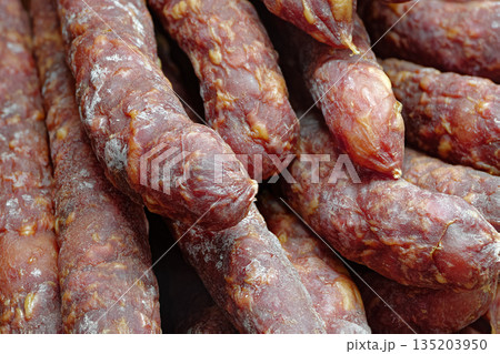 Group of smoked pork sausages 135203950