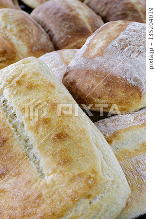 Ciabatta, traditional wheat bread Ciabatta, traditional wheat bread 135204019