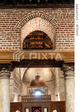 The interior of the Saints Sefgius and Bacchus Church. The Holy Family shelter. Coptic Orthodox Church in Coptic Cairo, Egypt. The interior of the Saints Sefgius and Bacchus Church. The Holy Family shelter. Coptic Orthodox Church in Coptic Cairo, Egypt. 135205444