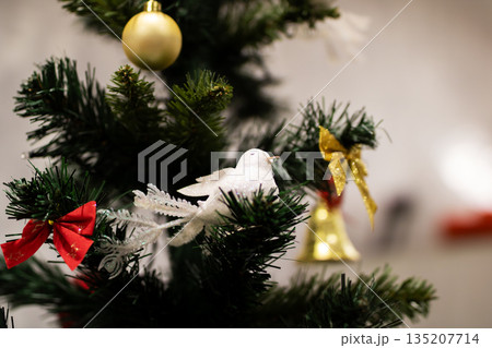 Intimate living room display showcasing holiday symbols of peace and family celebration 135207714