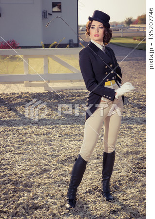 beautiful girl jockey posing 135207746