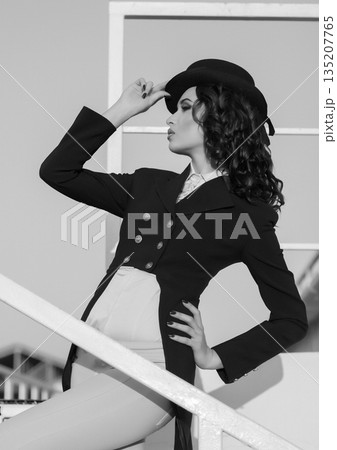 beautiful girl jockey posing 135207765