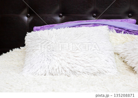 Soft textures and warm lighting, Modern bedroom with plush pillow and elegant accents 135208871