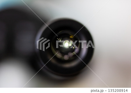 Detailed optical closeup, Close shot highlighting lens interior and subtle grain details 135208914