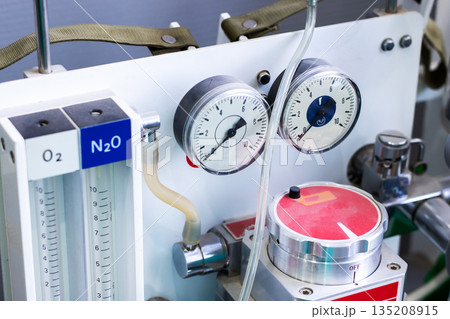 Detailed view of medical gas flowmeters and regulator for surgical anesthesia administration Detailed view of medical gas flowmeters and regulator for surgical anesthesia administration 135208915