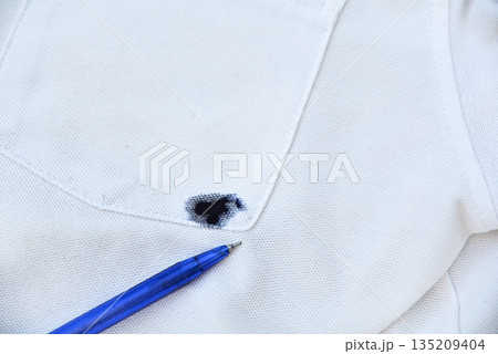 blue blue ink dirty stain  on white shirt for cleaning concept idea in work house 135209404