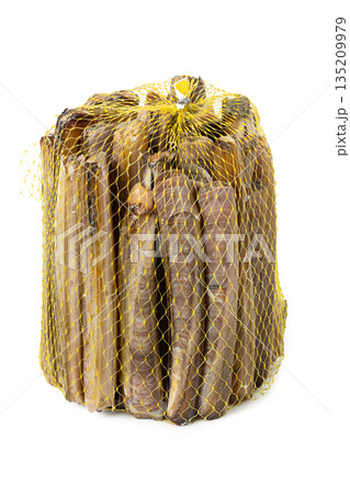 Fresh raw razor clams in mesh net isolated on white background Fresh raw razor clams in mesh net isolated on white background 135209979
